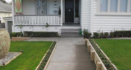 Large pot in the yard as a water feature that is lit up at night. Works well with villas.