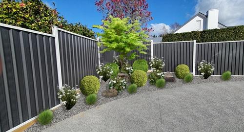 Small triangle garden area with low maintenance garden that looks tidy all year round.