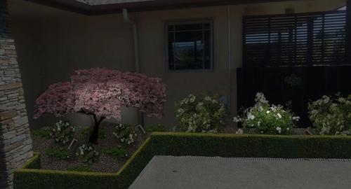 Entrance to house after using landscape imaging showing night lighting. This creates interest and added security to the house.