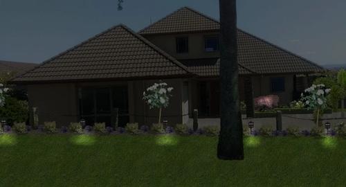 Entry to house after using landscape imaging showing night lighting. This creates interest and added security to the house.
