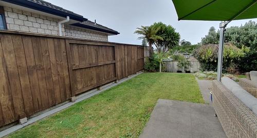 View of fence and neighbours from entertainment area