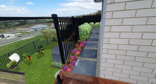 Stepping Stone Area Soften area with annuals, small hedge and stones around pavers